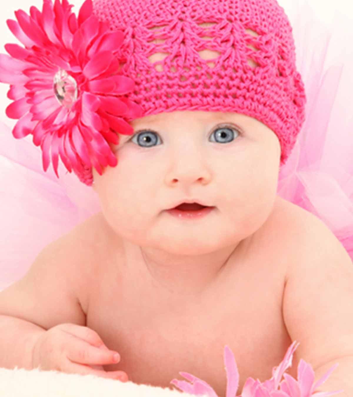 Beautiful baby with a cute pink headband