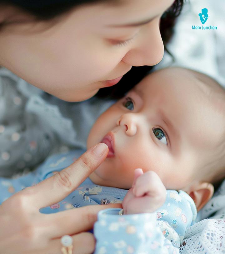 Baby SLeeping On Mother With Lip Quivers
