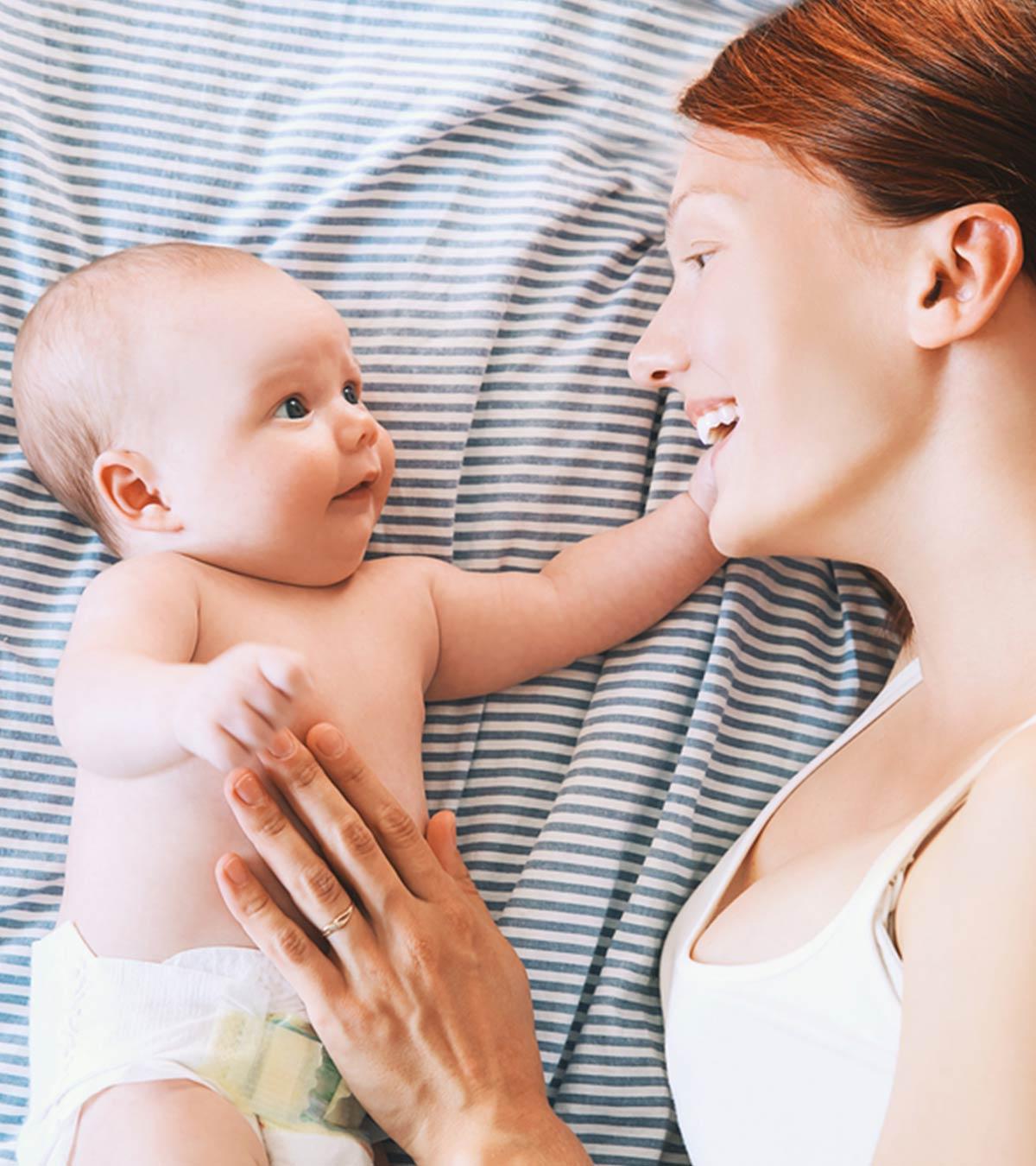 A mom playing with her baby