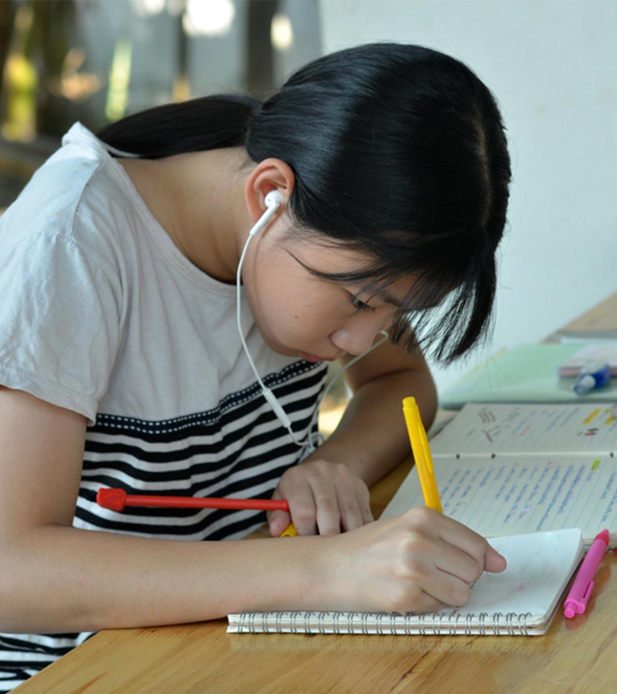 Teenager Practicing Handwriting