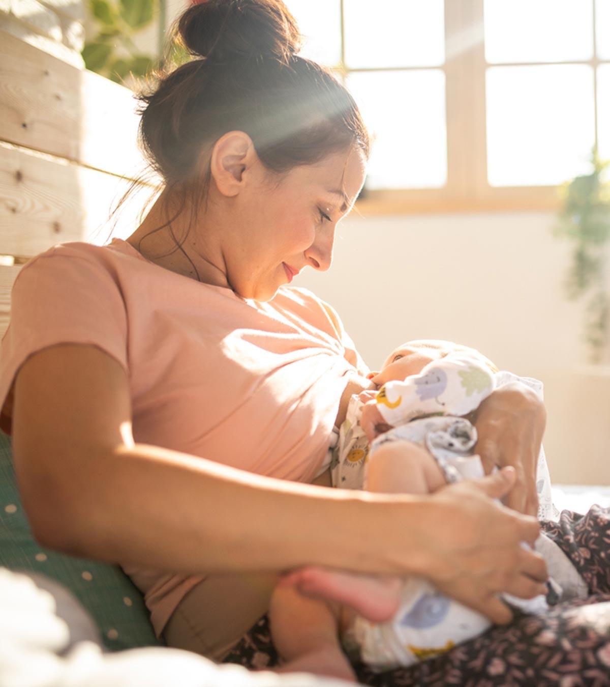 A mother breastfeeding her baby