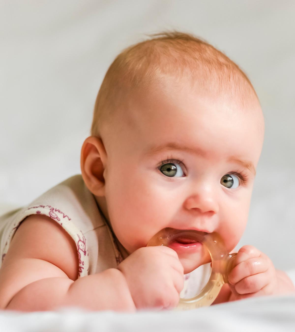 A Baby Using Teething Tablet