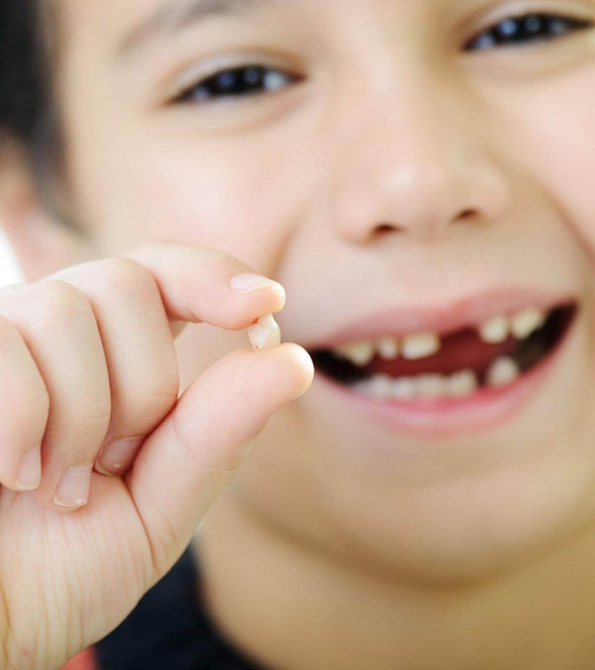 A kid has loosened her teeth