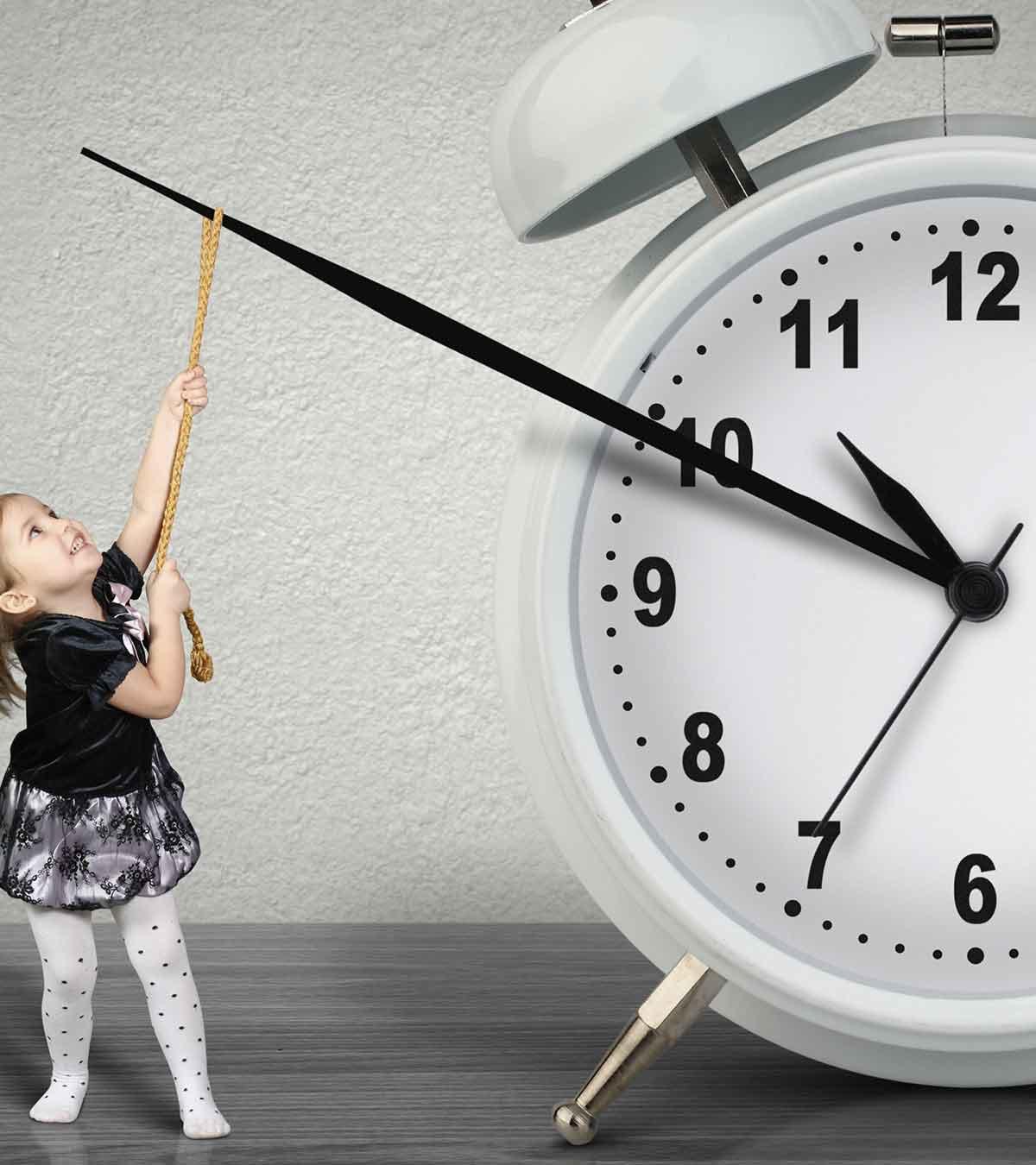 A small girl with a clock