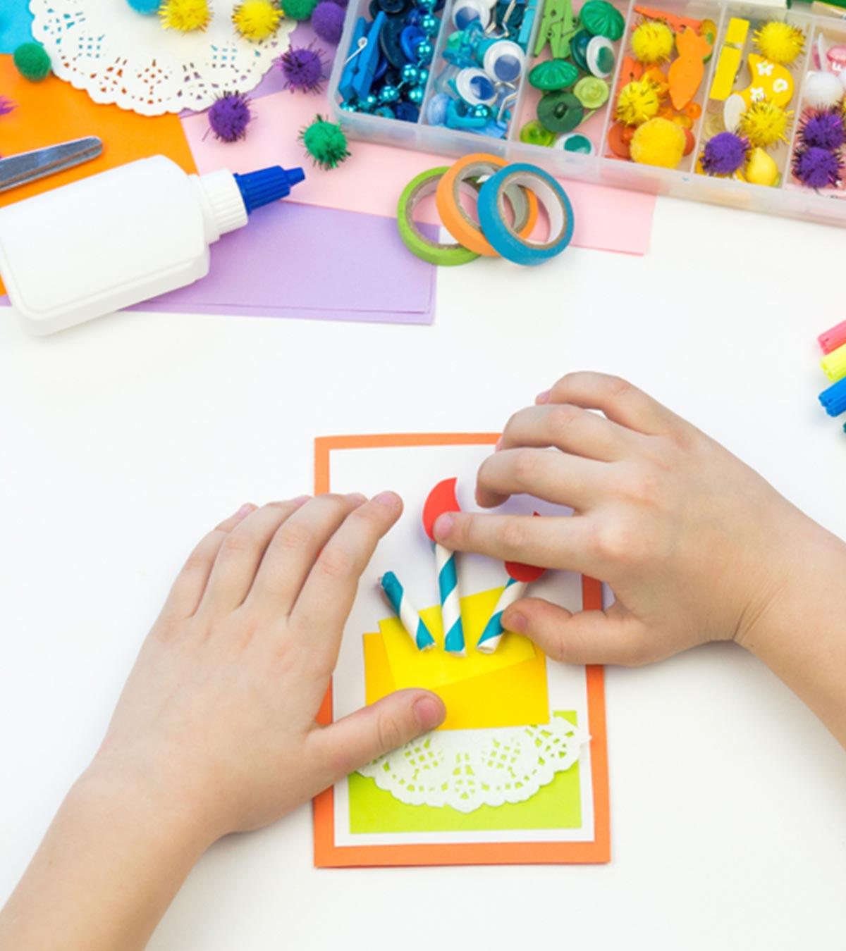 A kid doing some crafts