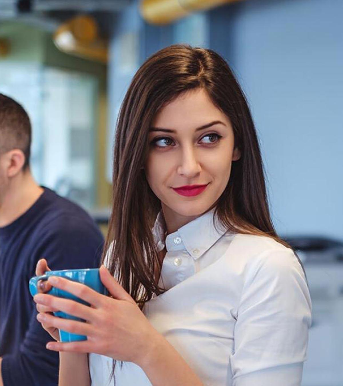 Woman Playfully Flirting With A Guy In A Casual Setting