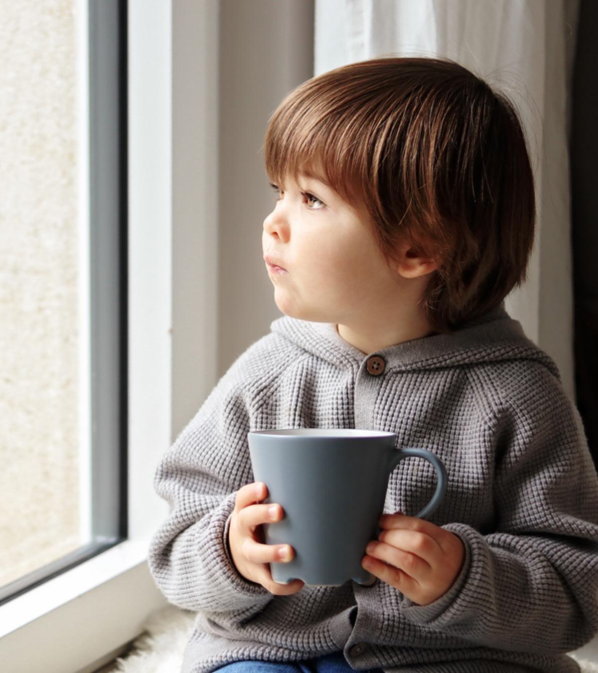 Toddler Having A Tea