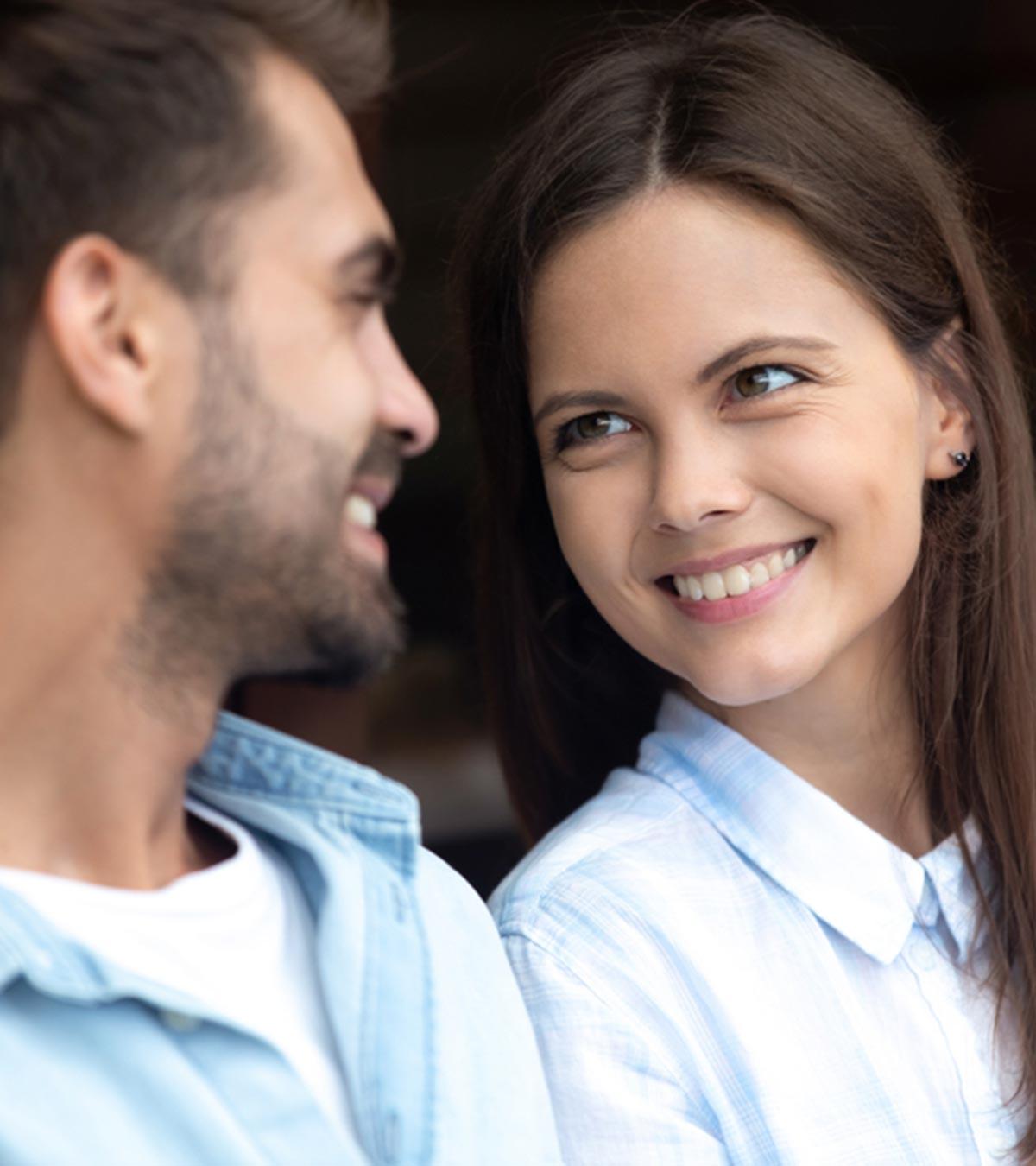 A couple smiling on their first date