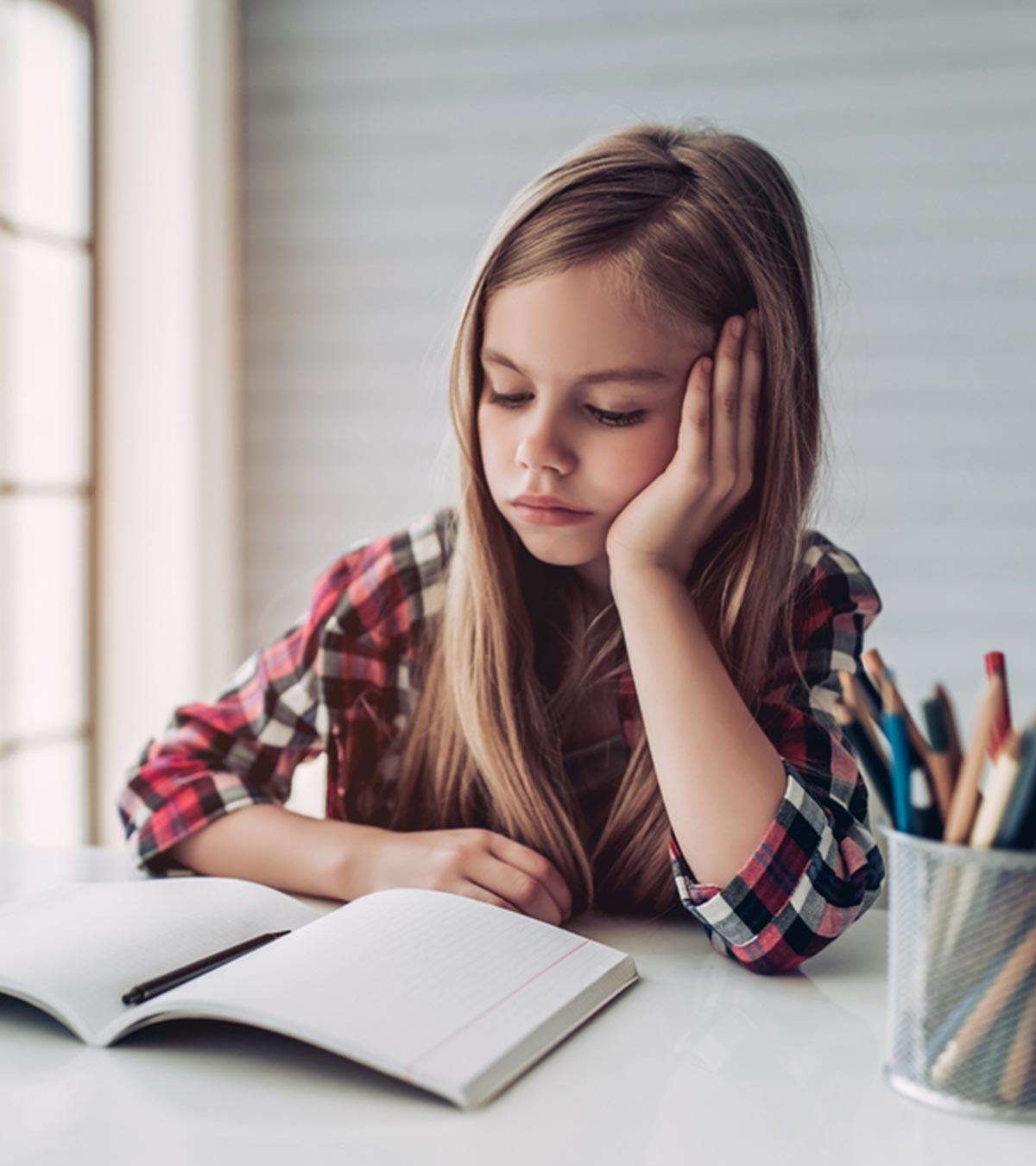 Tired Kid Sitting On A Chair