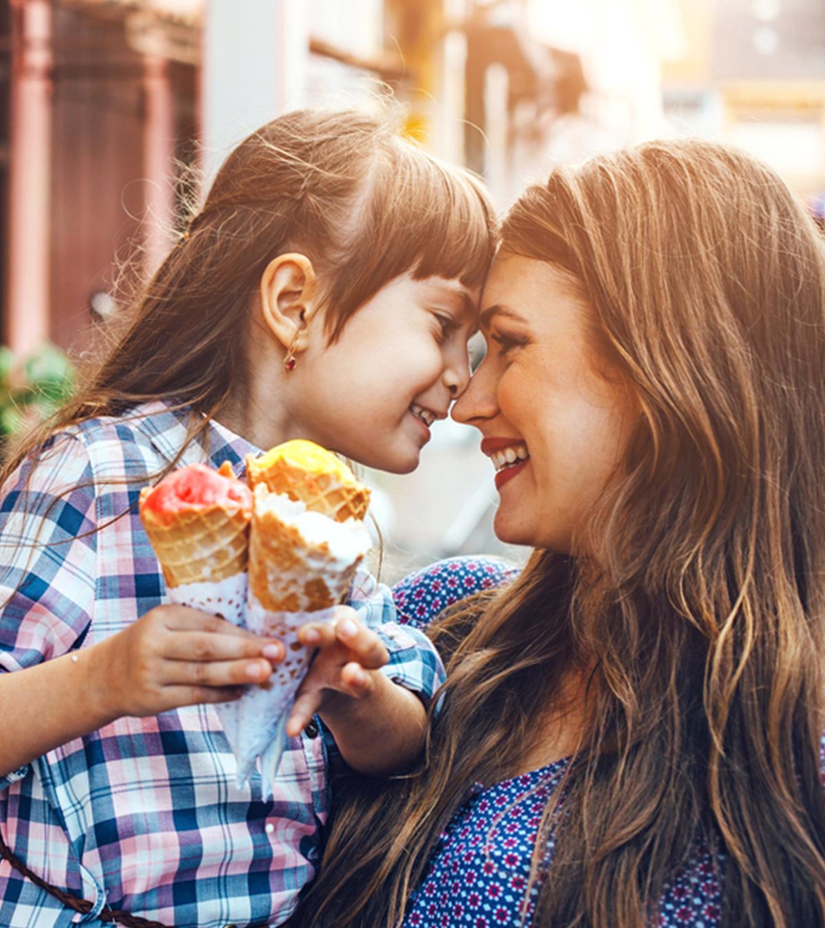 A mon and her daughter enjoying ice cream