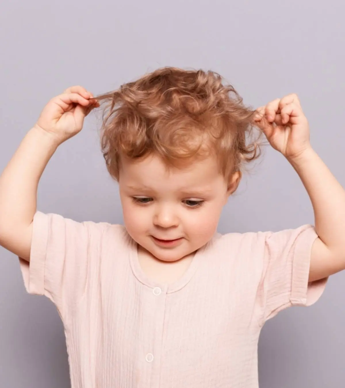 Understanding baby hair pulling behavior - normal developmental phase