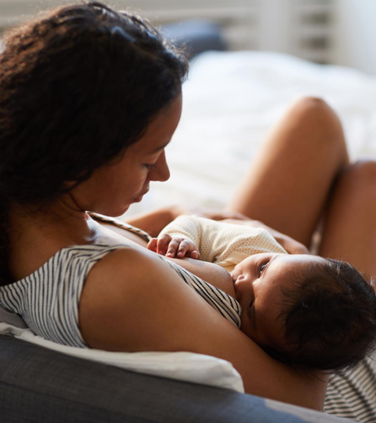 A lady breastfeeding her baby