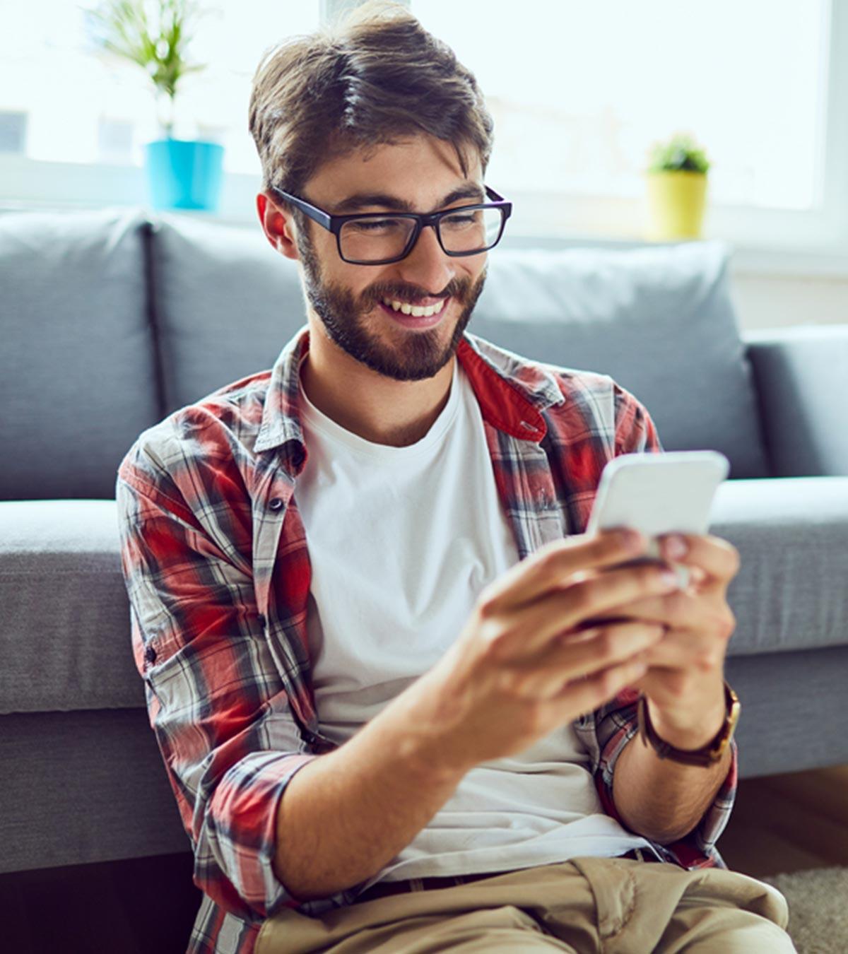 Person Texting On His Phone