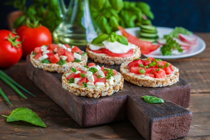 Rice cake and diced tomatoes open sandwich vegetable snacks for kids