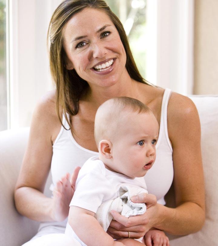 A Mother Making Her Baby To Burp