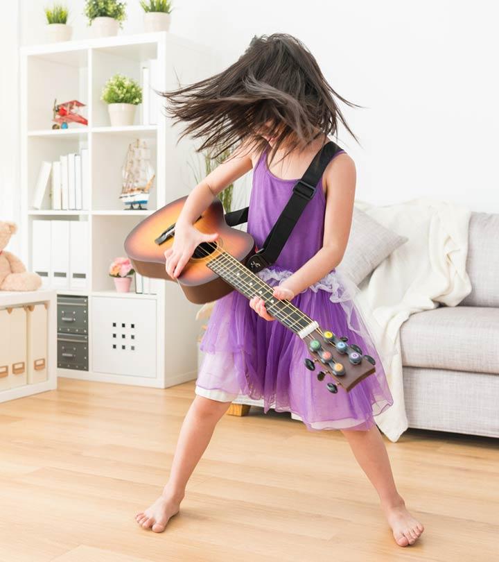 A kid playing guitar