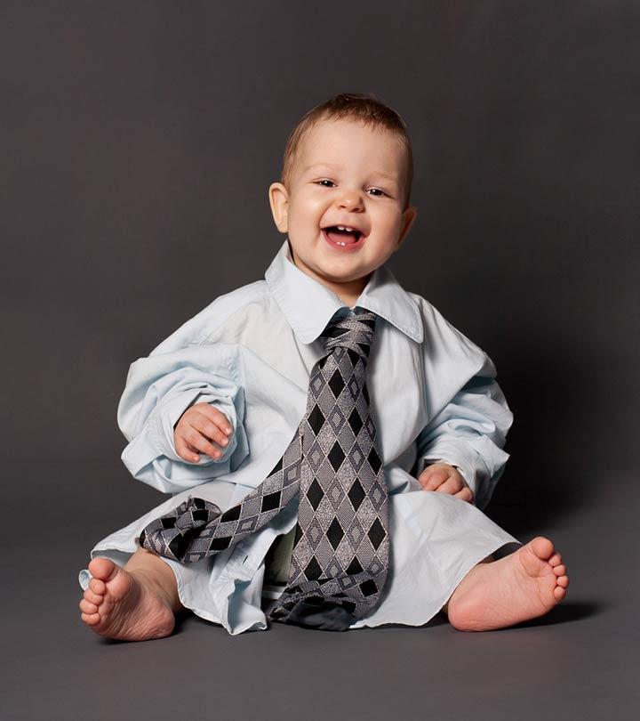 A small baby wears a