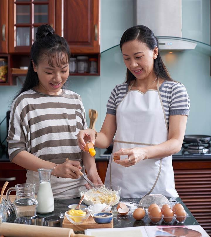 Mom And Teenage Daughter Doing Healthy Recipe