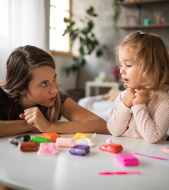 Toddler Playing A Matching Game, Indicating Fun Matching Activities