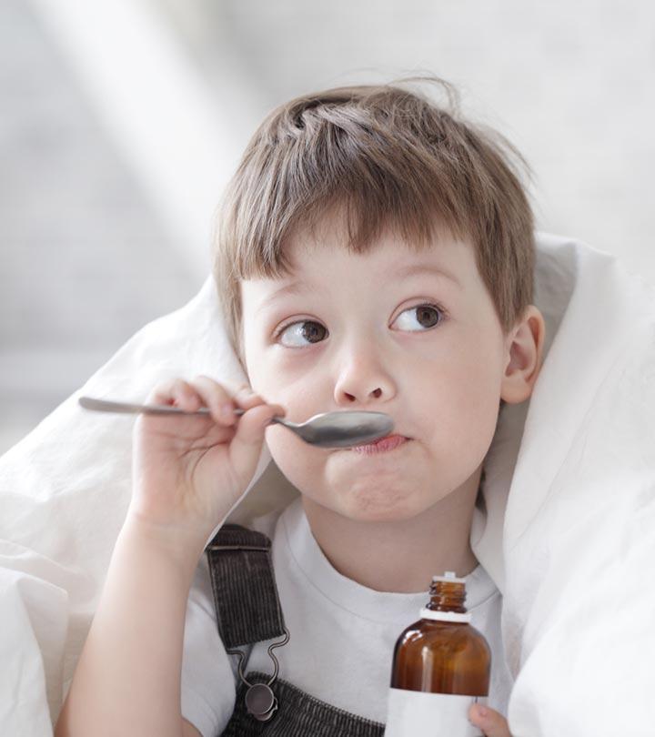 A kid taking antacid medicine