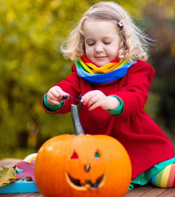 Toddlers Playing With Pumpkins