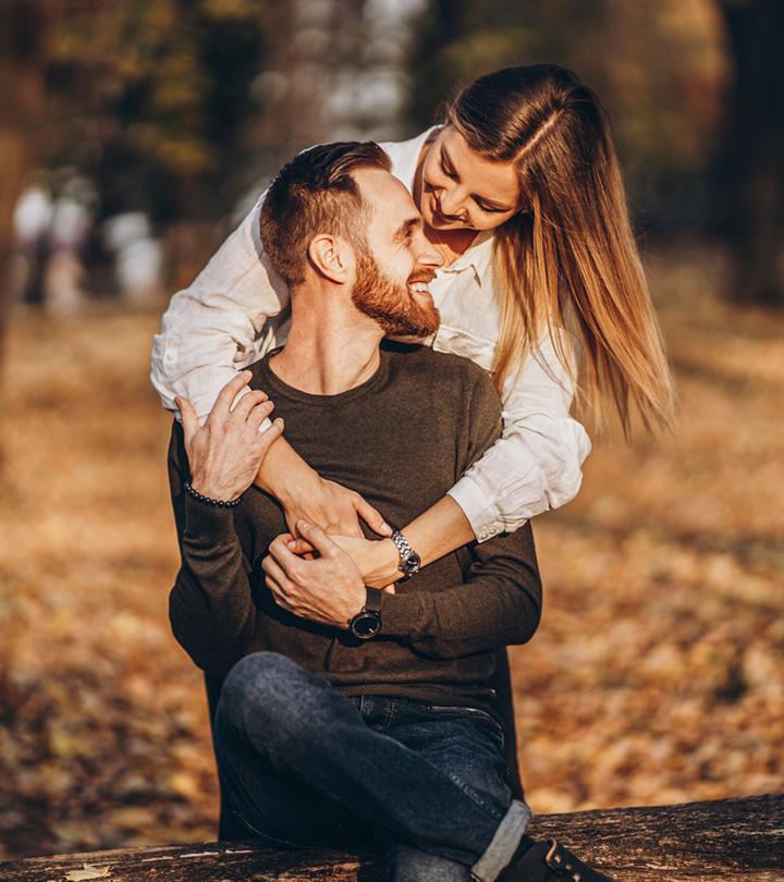 A romantic couple laughing together
