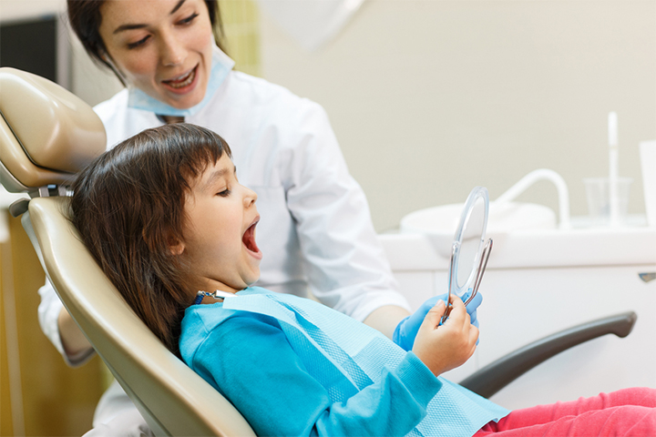 Take your child to a pediatric dentist for a checkup.