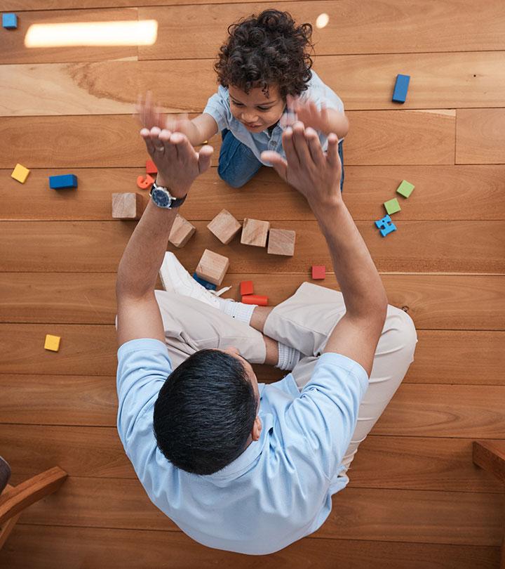Father High-fiving His Kid, Representing Positive Reinforcement