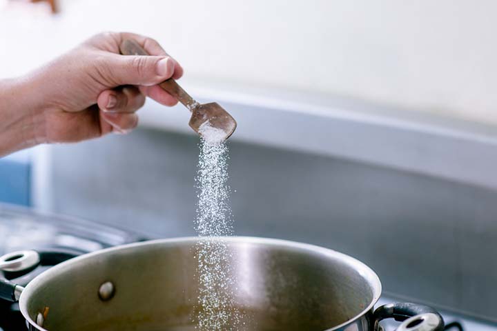 Add 1/4th tsp of salt to water to make saline nasal drops