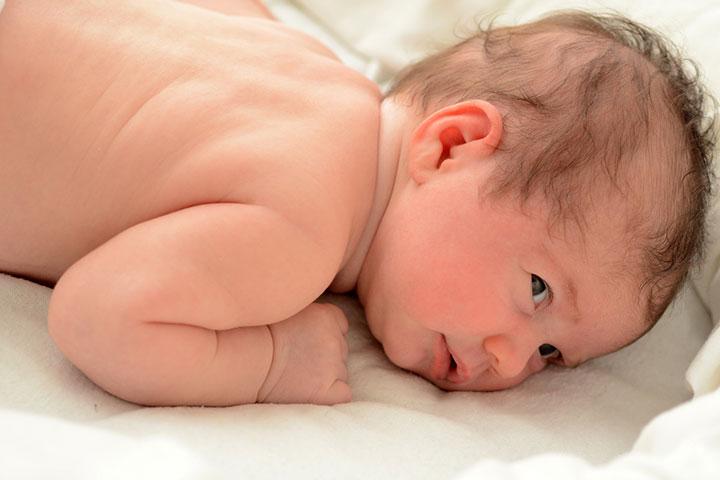 4 week old hot sale sleeping on stomach