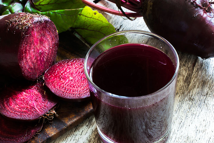 Blend beetroot pieces and strain the juice and apply it to your hair.