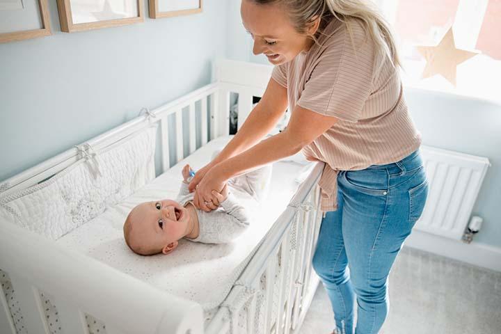 Place the baby in the crib and keep away sharp objects.