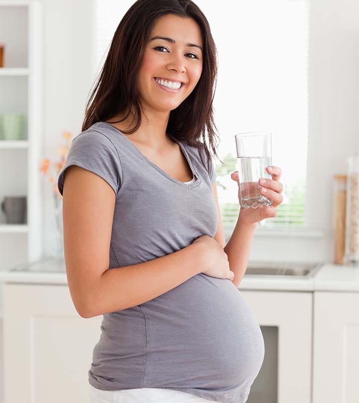 Pregnant Woman Having A Glass Of Water