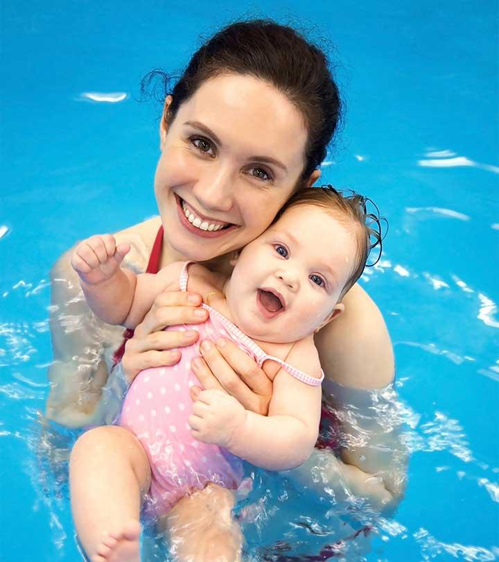 A Mom Swimming With Baby