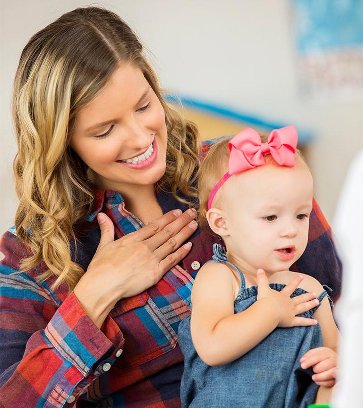 A Mom Teaching Baby Sign Language To Her Baby