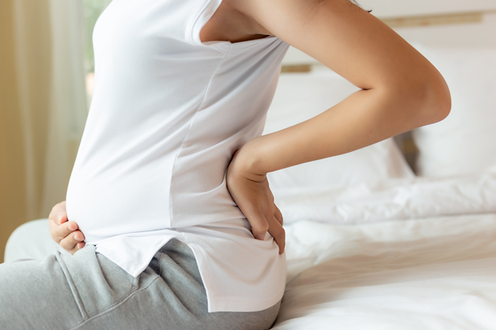 Using heating pad when pregnant can help ease back pain