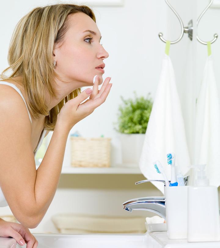 A Breastfeeding Mom Applying Retinol On her Face