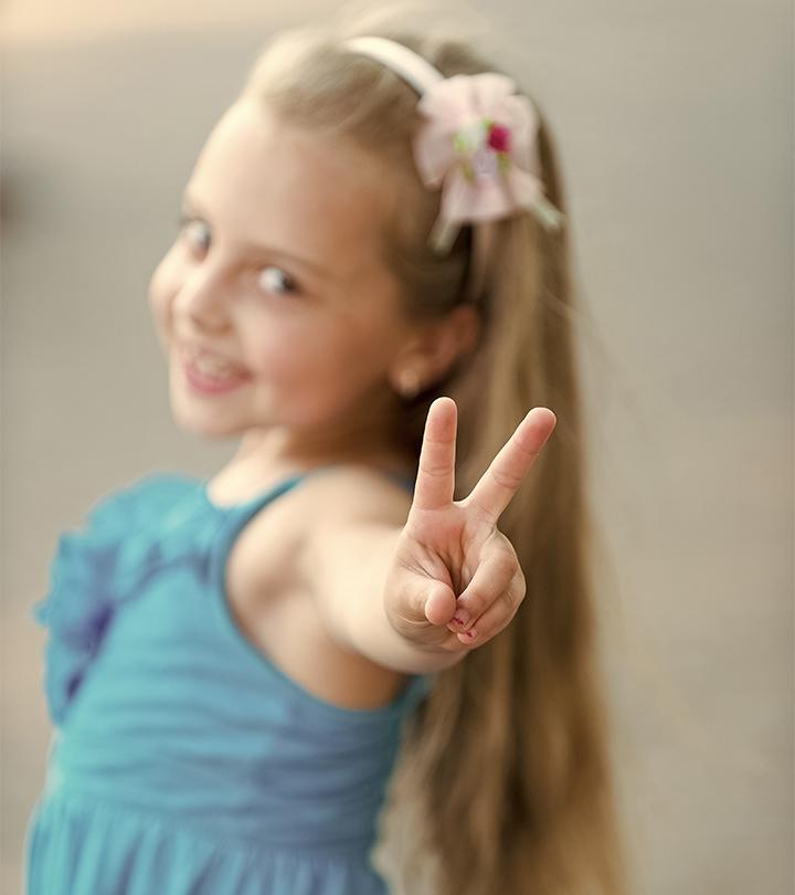 A kid showing her tw