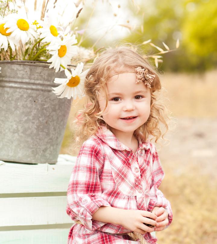 A cute baby girl is 